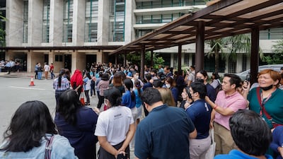 The quake sent people rushing out of buildings in the capital. EPA