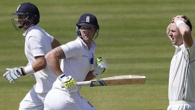 Joe Root, centre, and Ben Stokes run between the wickets during their partnership that helped steer England back into contention. Ian Kington / AFP