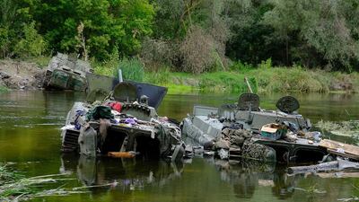 Half-submerged Russian tanks amid the Ukrainian counter-offensive in Kharkiv. AFP