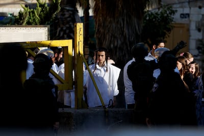 Israeli forces keep watch during Israeli settlers' weekly tour in Hebron. Reuters