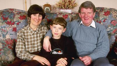At home with his family in 1997. Getty Images