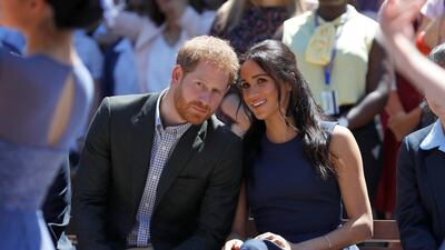 Prince Harry and Meghan watch a performance during their visit to Macarthur Girls High School. Reuters