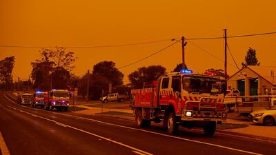 RFS Trucks gather in front of a station in Bodalla, New South Wales, Australia. Getty