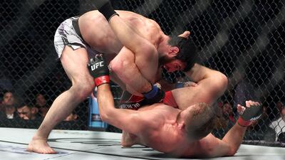 Jan Blachowicz attempts to fight from his back against Magomed Ankalaev. Getty