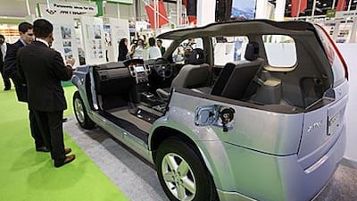 A cutaway version of Nissan's X-Trail hydrogen fuel cell vehicle, complete with fuelling nozzle.