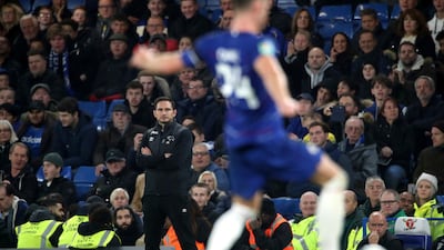Frank Lampard looks on from the touchline during the game. AP Photo