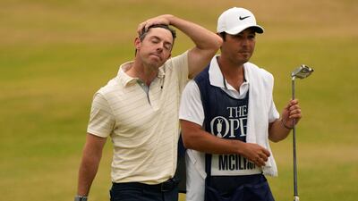 Rory McIlroy of Northern Ireland walk from the 18th green with his caddie after finishing his final round of the British Open golf championship on the Old Course at St. Andrews, Scotland, Sunday July 17, 2022. (AP Photo / Gerald Herbert)