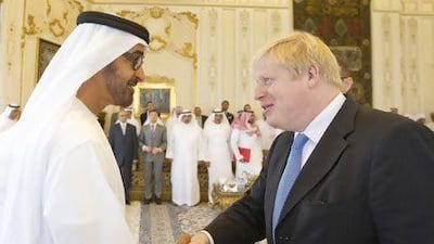 Sheikh Mohammed bin Zayed, Crown Prince of Abu Dhabi and Deputy Supreme Commander of the Armed Forces, receives Boris Johnson, the mayor of London, in the capital yesterday. Courtesy Wam