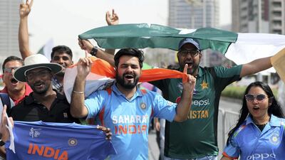 Dubai, United Arab Emirates - September 19, 2018: India and Pakistan fans before the game between India and Pakistan in the Asia cup. Wednesday, September 19th, 2018 at Sports City, Dubai. Chris Whiteoak / The National