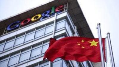 The Chinese flag is seen near the Google sign at the Google china headquarters in Beijing, China.