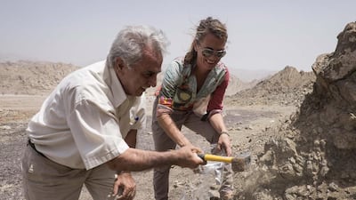 Ruth Impey, a UAE potter, and Mustafa Otaki, a retired professor of geochemistry, collect the clay from Wadi Haqeel which was used to produce Julfar ware. Antonie Robertson / The National