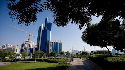 Baynunah Hilton Tower as seen from the Abu Dhabi Corniche Park. Finished in 1994, it became the city's tallest at 165 metres with 40 floors. Rich-Joseph Facun / The National