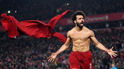 Liverpool striker Mohamed Salah of Liverpool celebrates after scoring his team's second goal during their 2-0 Premier League win over Manchester United at Anfield on Sunday, January 19. Getty