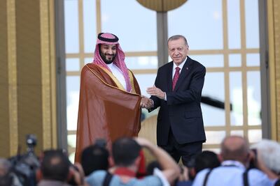 Turkish President Recep Tayyip Erdogan and Saudi Crown Prince Mohammed bin Salman pose for photographers before their meeting in Ankara. EPA