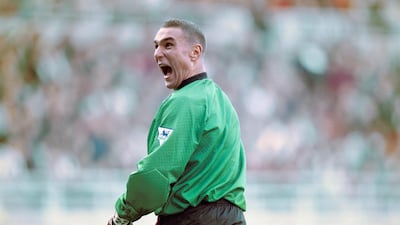 Wimbledon stand in goalkeeper Vinny Jones shares a joke with Newcastle fans in the Gallowgate end after taking over the gloves during the Premier League match at St James' Park which Newcastle won 6-1 in Newcastle Upon Tyne, England. Getty Images