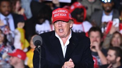 Former US President Donald Trump speaks during a rally at the Canyon Moon Ranch festival grounds in Florence, Arizona. AFP