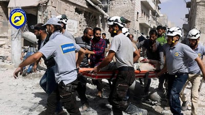 Syrian White Helmets rescue volunteers fear for their lives after they were left behind as government forces retook rebel-held southern Syria. Handout