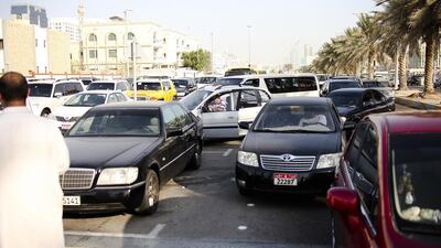 Families piled into their cars early on Sunday morning to drop off their children at school. Summer has officially ended and with the new school year comes early morning traffic. Lee Hoagland / The National