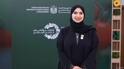 Dr Amna Al Dahak, Minister of Climate Change and Environment, highlighted government initiatives focused on helping farmers to thrive. Victor Besa / The National