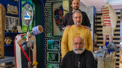 From front to back, Ramin Haerizadeh, Rokni Haerizadeh and Hesam Rahmanian at Gallery Isabelle Van Den Eynde in Dubai’s Alserkal Avenue, which they have turned into their work space this summer. Courtesy of Gallery Isabelle Van Den Eynde
