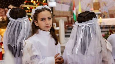 Christian Palestinian children attend a service at the Latin Church in Gaza city. AFP