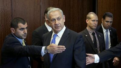 Israeli Prime Minister Benjamin Netanyahu, centre, arrives for a meeting yesterday with United Nations Secretary-General Ban Ki-moon during the 68th session of the General Assembly at UN headquarters, AP Photo/Seth Wenig