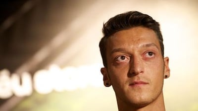 Mesut Ozil says he has spoken to Arsene Wenger and knows what he is required to do at Arsenal. AP Photo