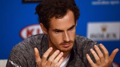 Andy Murray of Britain gestures at a news conference following his loss to Novak Djokovic of Serbia in their men's singles final match on day 14 of the 2016 Australian Open tennis tournament in Melbourne on January 31, 2016. AFP PHOTO / GREG WOOD