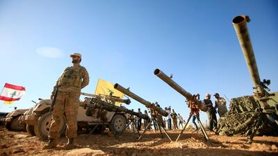 A Hezbollah fighter by anti-tank artillery at Juroud Arsal on the Syria-Lebanon border, on July 29, 2017. Ali Hashisho / Reuters