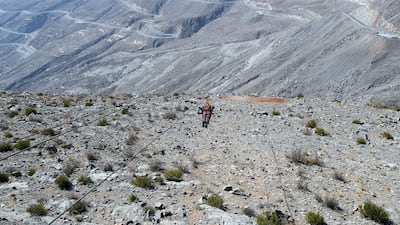 People fly the world's longest zip line at Jebel Jais in Ras Al Khaimah at Jebel Jasi, Ras Al Khaimah. Chris Whiteoak / The National