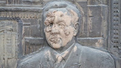 An artwork depicting independent Kazakhstan's first president Nursultan Nazarbayev, which was smeared with mud during recent protests triggered by fuel price increase. Photo: Reuters