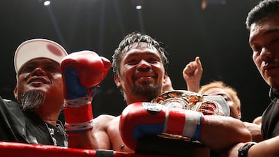 Manny Pacquiao celebrates after winning the bout against Lucas Matthysse. Reuters
