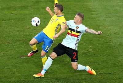 Marcus Berg, left, in action for Sweden against Belgium at Euro 2016. Ali Haider / EPA