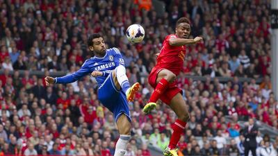 Liverpool’s Raheem Sterling, right, fights for the ball against Chelsea’s Mohammed Salah during their English Premier League soccer match at Anfield Stadium, Liverpool, England, Sunday April 27, 2014. AP Photo/Jon Super