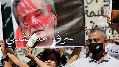 Demonstrators in Beirut protest against former central bank governor Riad Salameh, who is alleged to have embezzled millions of dollars of public funds. EPA