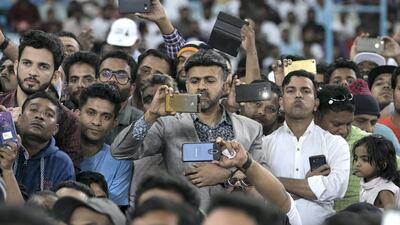 Crowds listen to Rahul Gandhi at Dubai International Cricket Stadium. Reem Mohammed / The National