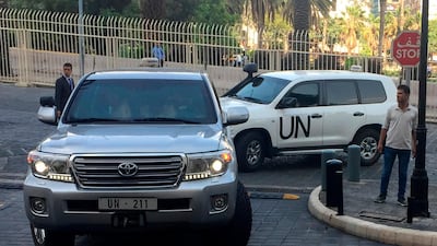 UN vehicles carrying the team of the Organization for the Prohibition of Chemical Weapons (OPCW). AP, File