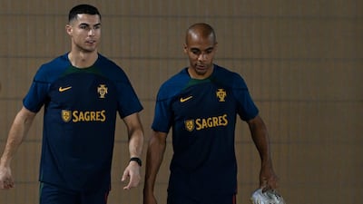 Portugal forward Cristiano Ronaldo and midfielder Joao Mario arrive for training. AFP