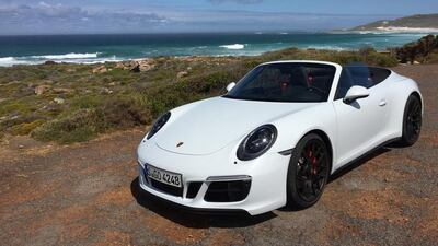 Porsche 911 Carrera 4 GTS cabriolet at the Cape of Good Hope, South Africa. Adam Workman / The National