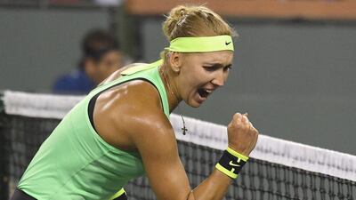 Elena Vesnina celebrates after beating Venus Williams in the Indian Wells quarter-finals. Mark J Terrill / AP Photo