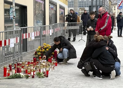 A makeshift memorial at the site in Villach, Austria where a child was killed in a terrorist attack. AFP
