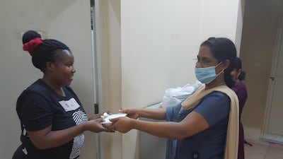 A delivery of hot food is made by a Meals of Grace volunteer in Dubai. Courtesy: Courtesy: St Mary's Catholic Church