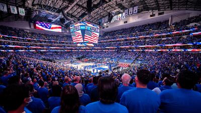 Players and fans stand for the national anthem before the NBA Play-off game between the Dallas Mavericks and LA Clippers at the American Airlines Centre in Dallas, Texas on Friday, May 28. Reuters
