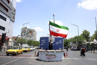 There are still signs of patriotism in Tehran. EPA