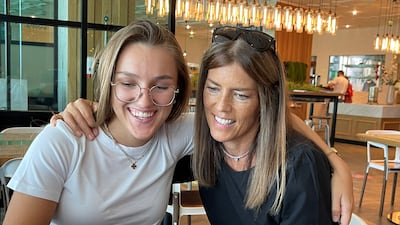 Brighton College Abu Dhabi pupil Laura Hurn has some moral support as she discovers her A-level results.