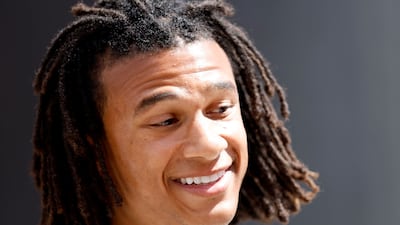 Manchester City's Nathan Ake enjoys the pre-race atmosphere. Reuters