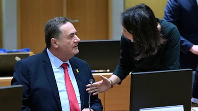 Israeli Foreign Minister Israel Katz talks with German counterpart Annalena Baerbock during a meeting at the EU's headquarters in Brussels on Monday. Mr Katz was later criticised for bringing up the topic of building an artificial island off the coast of Gaza during discussions. AFP