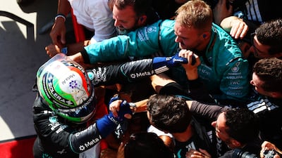 Kimi Antonelli celebrates with his Mercedes team after winning his home race in Italy. Getty Images