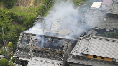 Smoke arise from a house where a fire breaks out, in Takatsuki, Osaka. Reuters