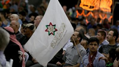 Supporters attend a campaign conference for the Jordan's National Alliance for Reform in Amman's Sweileh district. Khalil Mazraawi / AFP